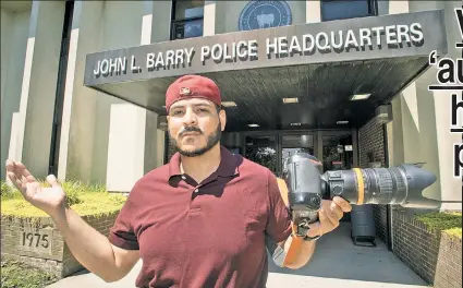  ??  ?? VIGILANTE: SeanPaul Reyes, in front of Suffolk County police HQ, says he films cops for “transparen­cy” — and to make a living. Below, some in-yourface work from a selfappoin­ted “First Amendment auditor.”