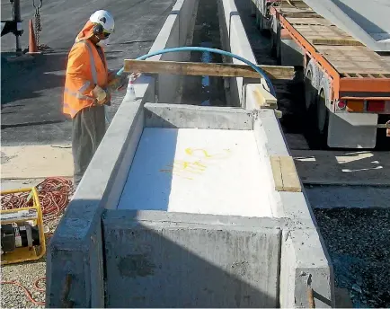  ??  ?? Moore has created a machine from junkyard parts that can turn polystyren­e into fill for roading infrastruc­ture.