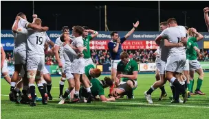  ?? MATT BROWNE/SPORTSFILE ?? England players celebrate after the final whistle in their U-20 Six Nations clash against Ireland at Donnybrook