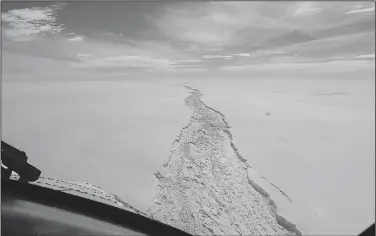  ?? British Antarctic Survey ?? The breakaway part of the Larsen C ice shelf is shown in this aerial photo taken in February and released Wednesday.