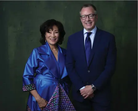  ?? CHRIS PIZZELLO — THE ASSOCIATED PRESS ?? President of the Academy of Motion Picture Arts and Sciences Janet Yang, left, and CEO of the Academy of Motion Picture Arts and Sciences Bill Kramer pose for a portrait during the 96th Academy Awards Oscar nominees luncheon on Feb. 12at the Beverly Hilton Hotel in Beverly Hills. “There's a lot of great energy around the movies of 2023,” Kramer said.