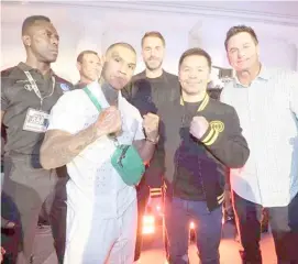  ?? PHOTOGRAPH COURTESY OF SEAN GIBBONS ?? MANNY Pacquiao and Connor Benn strike a pose while promoter Eddie Hearn (middle) and MP Promotions chief Sean Gibbons look on during the official weigh-in of the Anthony Joshua versus Francis Ngannou heavyweigh­t match in Riyadh, Saudi Arabia.