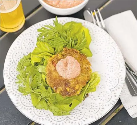  ?? ?? “Crabcakes are an essential part of Southern coastal cooking,” Alexander Smalls writes in “Meals, Music, and Muses.”