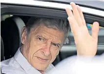  ??  ?? Final goodbye: Arsene Wenger makes an emotional exit at Arsenal’s London Colney training ground yesterday after clearing out his desk and saying farewell to his back-room team