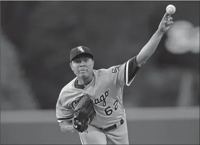  ?? Associated Press ?? Headed to the Cubs: In this July 8, 2017, file photo, Chicago White Sox starting pitcher Jose Quintana delivers against the Colorado Rockies in the first inning of a baseball game in Denver. The Chicago Cubs acquired the left-handed pitcher from the...