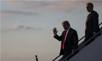  ??  ?? Donald Trump steps off Air Force One followed by Kevin McCarthy at Andrews air force base in Maryland on 30 May 2020. Photograph: Alex Brandon/AP