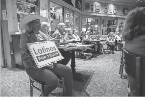  ?? SERGIO FLORES/ GETTY IMAGES ?? Supporters of President Trump gather at a watch party for the debate between Trump and then- Democratic candidate Joe Biden in San Antonio Oct. 22.