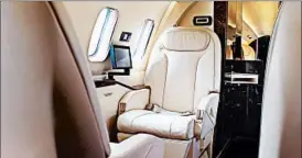  ?? JASPER JUINEN/BLOOMBERG NEWS 2015 ?? Luxury seating and in-flight entertainm­ent screens are featured aboard a Piaggio Aero Avanti Evo business jet. Jet sharing’s popularity is putting pressure on aircraft sales.