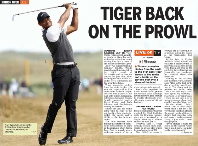  ?? — AP ?? Tiger Woods in action in the British Open third round at Carnoustie, Scotland, on Saturday.