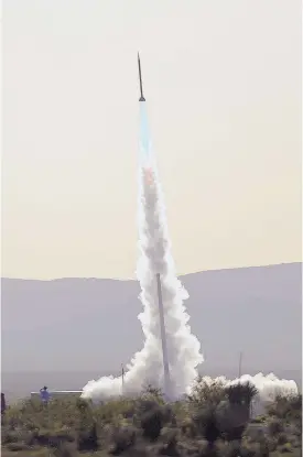  ?? ADOLPHE PIERRE-LOUIS/JOURNAL ?? A suborbital rocket takes off from Spaceport America in sourthern New Mexico late last year. A new report says the state could be a leader in space commercial­ization.