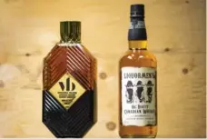  ?? RANDY RISLING/TORONTO STAR ?? Drake’s Virginia Black Decadent American Whiskey and Trailer Park Boys’ Liquormen’s Ol’ Dirty Canadian Whisky are both new at the LCBO.