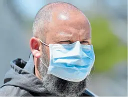  ?? BARRY GRAY THE HAMILTON SPECTATOR ?? Forge FC head coach Bobby Smyrniotis is pictured on the pitch at Tim Hortons Field in Hamilton, with strict protocols in place because of COVID-19.