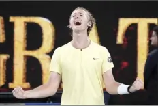  ?? AP photos BOTTOM PHOTO: ?? TOP PHOTO: Sebastian Korda celebrates after defeating Daniil Medvedev in their third-round match at the Australian Open on Friday.
Jessica Pegula plays a backhand return to Marta Kostyuk during Pegula’s third-round win Friday.