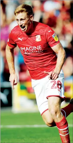  ??  ?? AT THE DOUBLE: Swindon Town forward Eoin Doyle celebrates