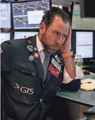  ?? GETTY IMAGES ?? Stocks fell Tuesday after President Donald Trump doused hopes for a quick stimulus deal.