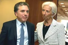  ??  ?? Internatio­nal Monetary Fund (IMF) managing director Christine Lagarde greets Argentina’s Treasury Minister Nicolas Dujovne ahead of their meeting at the IMF on a new loan request in Washington, May 10. — Reuters photo