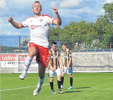  ?? George McLuskie. ?? Rovers striker Greig Spence celebrates after scoring in the 5-0 win in Methil.