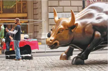  ?? Bloomberg ?? The Wall Street bull in New York, US. The current bull market is commonly thought to have started on March 9, 2009, when the S&amp;P 500 closed at 676.53 as the US grappled with the global financial crisis. Since then, the index has more than quadrupled, closing Friday at 2850.13.