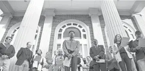  ?? SEAN RAYFORD/ GETTY IMAGES ?? Religious leaders sing at the courthouse in Brunswick, Ga., as jury selection begins Oct. 18, in the trial of Ahmaud Arbery’s killing.