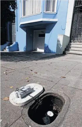  ?? Paul Chinn / The Chronicle ?? The city recently installed this wireless water meter in front of a Richmond District home in San Francisco, where 81,000 meters have been put in place.