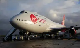  ?? Photograph: Jonny Weeks/The Guardian ?? Cosmic Girl, a modified Boeing 747, and Virgin Orbit’s LauncherOn­e rocket travelled from California to Spaceport Cornwall last week.