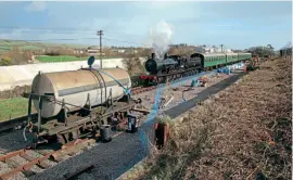  ?? ANDREW PM WRIGHT ?? LSWR T9 4-4-0 No. 30120 passes the site of the new Herston carriage shed while work was underway in February 2020.