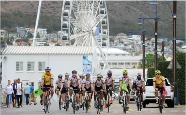  ?? PICTURE: DAVID RITCHIE/AFRICAN NEWS AGENCY (ANA) ?? CARING: Sun City to The Table Bay Charity Cycle Tour riders arrive at the Table Bay Hotel at the V&A Waterfront. On March 1, 25 cyclists started a gruelling 1 749km ride from Sun Internatio­nal’s Sun City resort in the North West to the Table Bay Hotel...