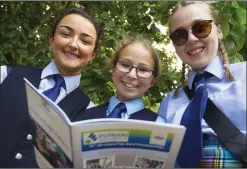  ??  ?? LEFT: Hollie O’Callaghan, Croía Davey and Enya Berns of New Ross and District Pipe Band at the All Ireland Pipe Band Championsh­ips at New Ross Town Park. BELOW: Claire Barr singing the national anthems at the 4th of July celebratio­ns at the Dunbrody...