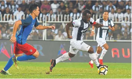  ??  ?? Bad news: Kipre Tchetche (centre) is still doubtful for Terengganu’s Super League match against Perak at the Perak Stadium in Ipoh tonight.