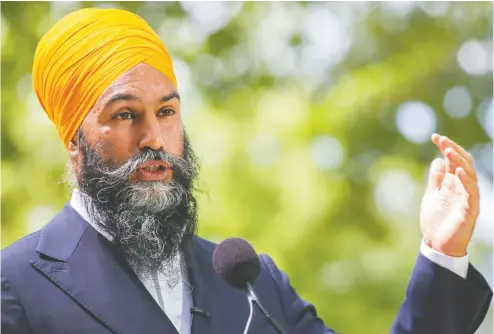  ?? CHRISTINNE MUSCHI / REUTERS FILES ?? Much of what the NDP has promised under leader Jagmeet Singh would be popular with progressiv­es,
but as columnist Adam Zivo points out, money doesn’t fall from the sky.