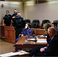  ?? HELEN H. RICHARDSON/THE DENVER POST VIA AP ?? Ahmad Al Aliwi Alissa, 21, appears before a judge on Thursday, three days after he was led away in handcuffs from a Boulder, Colo., supermarke­t where 10 people were fatally shot.