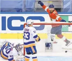  ?? GETTY ?? Panthers’ Jonathan Huberdeau celebrates a second period goal against Semyon Varlamov (l.) on Wednesday in Toronto.