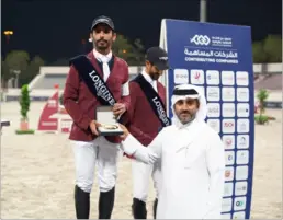  ?? ?? Mohammed Dha Al Marri astride Destiny 297 won the Small Tour of the 12th round of Longines Hathab which got underway at the Qatar Equestrian Federation’s outdoor arena on Thursday. Al Marri clocked 55.16 secs to win the round ahead of Faris Saad Al Qahtani (Hidiene) and Mohammed Abdulla Juma (Fito R), who clocked 55.46 and 56.44secs respective­ly. Hadi Mansour Al Shahwani, who teamed up with Coco Chanel SB, prevailed in the 80cm Future Riders category, while Sultan Jassim Al Suwaidi rode Tabra Blue to win in the 60m Future Riders event. Longines Hathab Deputy Director Faisal Al Kahla honoured the winners.