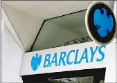  ??  ?? This file photo shows the
sign on a branch of Barclays Bank in London.
(AP)