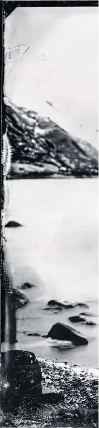  ?? ?? David Whalley looks up towards the F111 crash site at Sgùrr na Strì in a photo taken by Simon Riddell using the wet plate collodion process