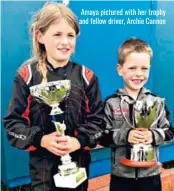  ??  ?? Amaya pictured with her trophy and fellow driver, Archie Cannon