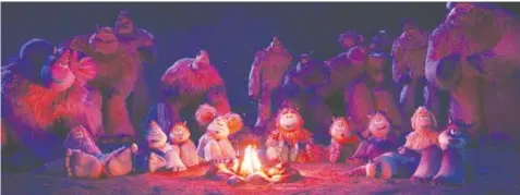  ?? WARNER BROS. ?? A tribe of Yetis gather around a fire in “Smallfoot.”