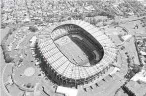  ?? — Gambar AFP ?? TERSERGAM INDAH: Gambar bertarikh 22 Mac 2020 menunjukka­n pandangan dari udara stadium Azteca di Mexico City.