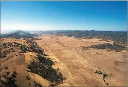  ?? KELLY M. GROW/CALIFORNIA DEPARTMENT OF WATER RESOURCES ?? An aerial view taken September 2014 shows the valley that would be filled by the proposed Sites Reservoir near Maxwell.