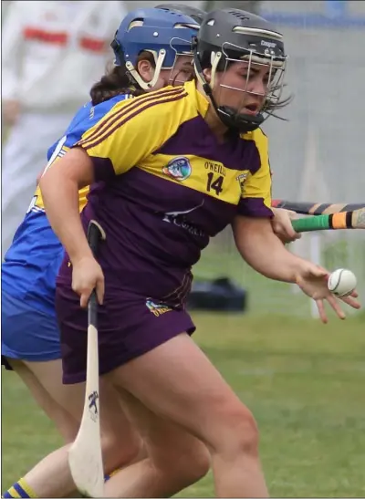  ??  ?? Full-forward Una Leacy is closely policed by Tipperary defender Julie Anne Bourke.