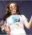  ?? SANTIAGO COVARRUBIA­S/ FOR THE SUN- TIMES ?? British singer- songwriter Charli XCX takes the stage Sunday.