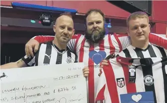  ??  ?? Kenny Ashton,, David Bygate-Pittiglio and Gaz Horsley with the first cheque submitted to the Bradley Lowery Foundation before more cash was added to the grand total.