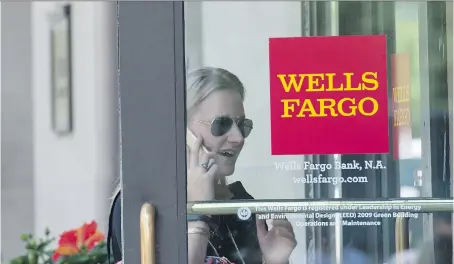  ?? NICHOLAS KAMM/AFP/GETTY IMAGES ?? A Wells Fargo bank in Washington, D.C. An investigat­ion by Wells Fargo’s board of directors recommende­d that CEO John Stumpf and community bank executive Carrie Tolstedt have additional compensati­on clawed back for their negligence and poor management.