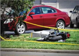  ?? MARSHALL GORBY/STAFF ?? A motorcycli­st was killed in a crash Thursday afternoon on Zink Road near Eagle Highlands Drive in Fairborn.