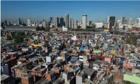  ?? Photograph: The Guardian ?? Closely packed houses in Villa 31, one of the largest slums in Buenos Aires.