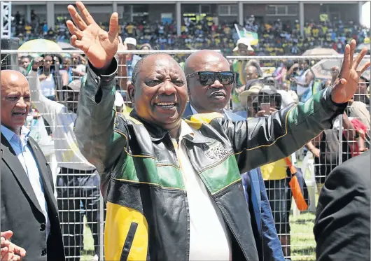  ?? Picture:LULAMILE FENI ?? CELEBRATOR­Y MOOD: ANC deputy president Cyril Ramaposa greets the crowd at the 105th birthday celebratio­ns of the ANC at Walter Sisulu University Stadium in Mthatha yesterday