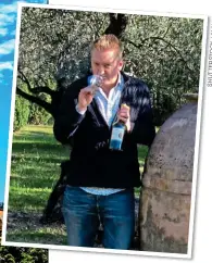  ??  ?? A NOSE FOR A GOOD WINE: Giles during his trip. Left: The spectacula­r Pont du Gard aqueduct