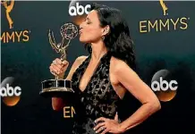  ?? MARIO ANZUONI/REUTERS ?? Actress Julia Louis-Dreyfus with her award for Outstandin­g Lead Actress In A Comedy Series.