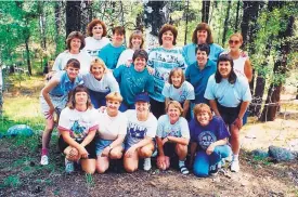  ??  ?? Pictured are women who were in Girl Scout Senior Troop 390, now called the Wild Women. This was their first reunion in 1998 in Vallecitos, Colo., as they were all nearing 40 years old. They reunite once a year.