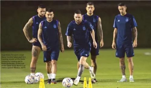  ?? (AFP) ?? Argentina’s forward Lionel Messi (centre) takes part in a training session at the Qatar University training site in Doha yesterday, on the eve of the Qatar 2022 World Cup match against Mexico.